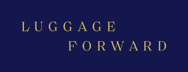 Luggage Forward stacked gold logo on navy blue background