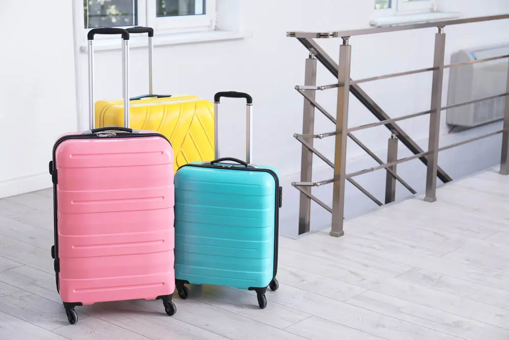 Colorful suitcases at a school