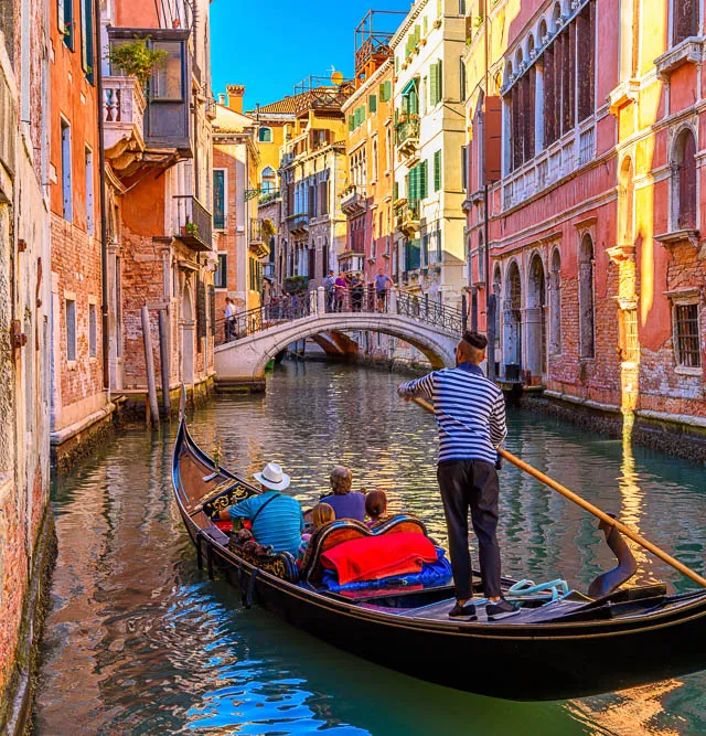 Riding a gondola in Venice Italy